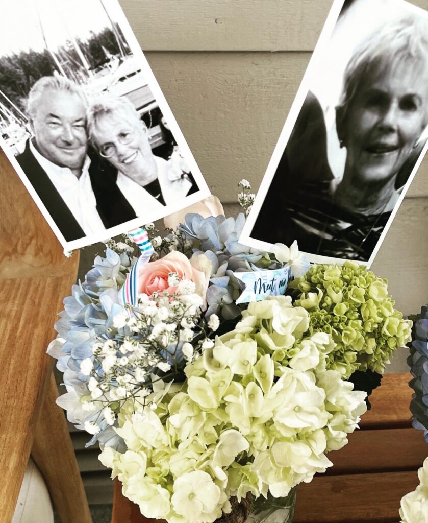 Floral memorial display with keepsakes at a celebration of life